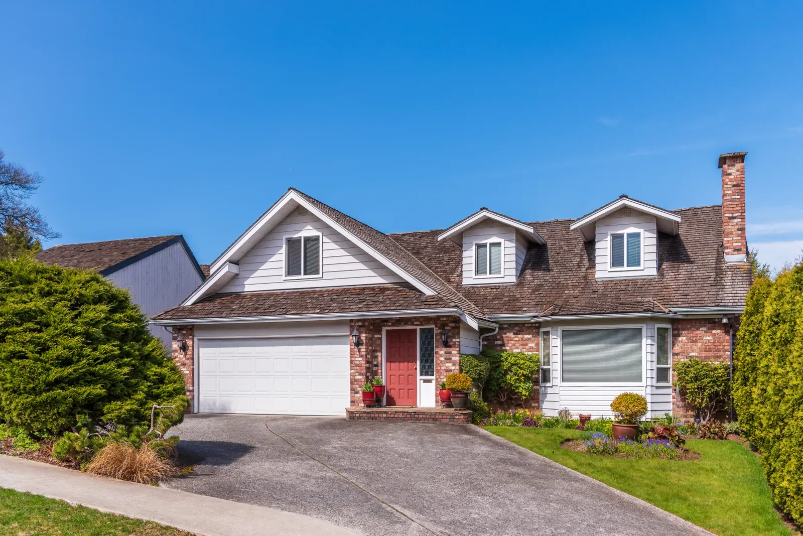 A photo of a residential roof being replaced after impact damage. | You First Home Services