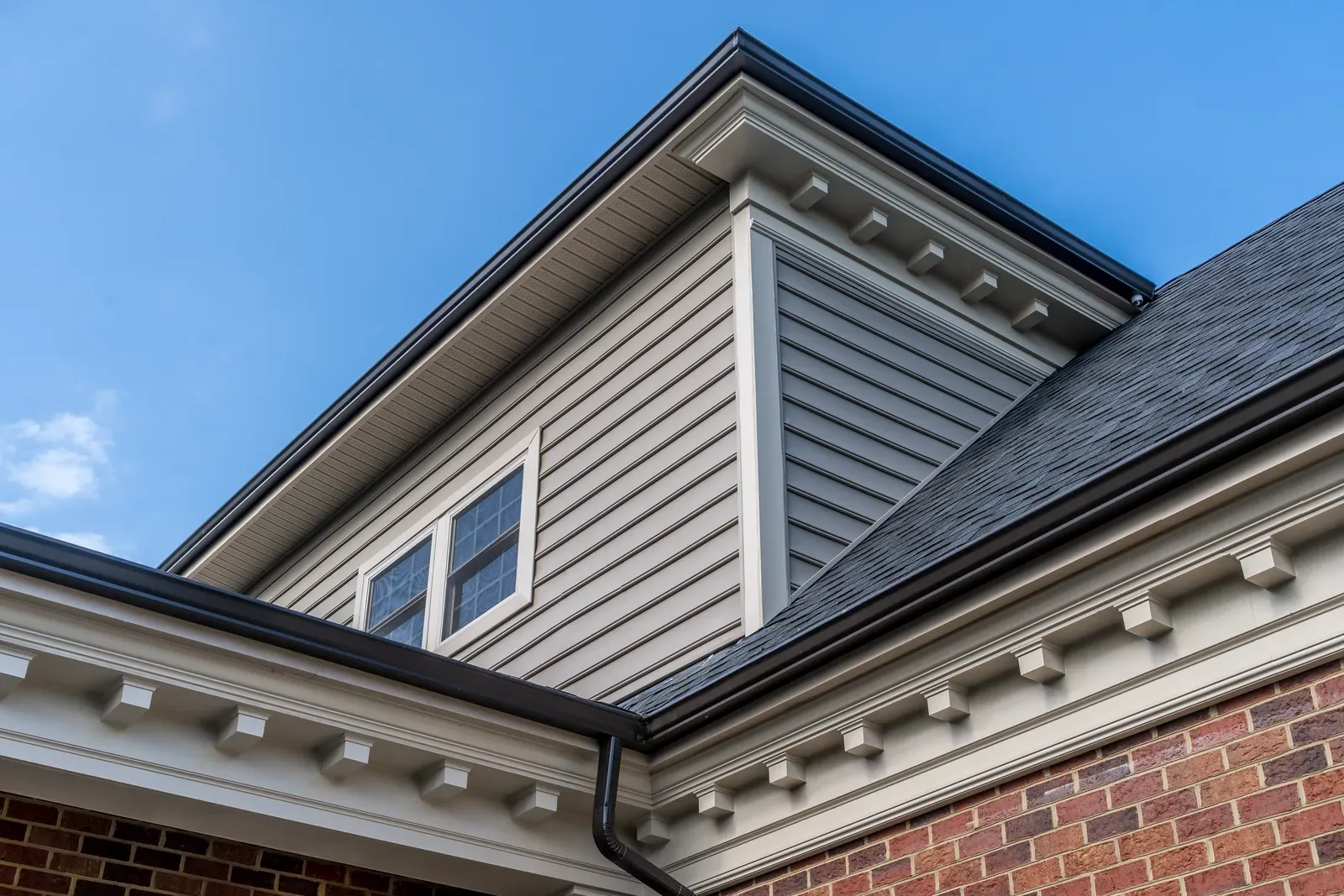 a residential aluminum gutter being replaced or repaired | You First Home Services