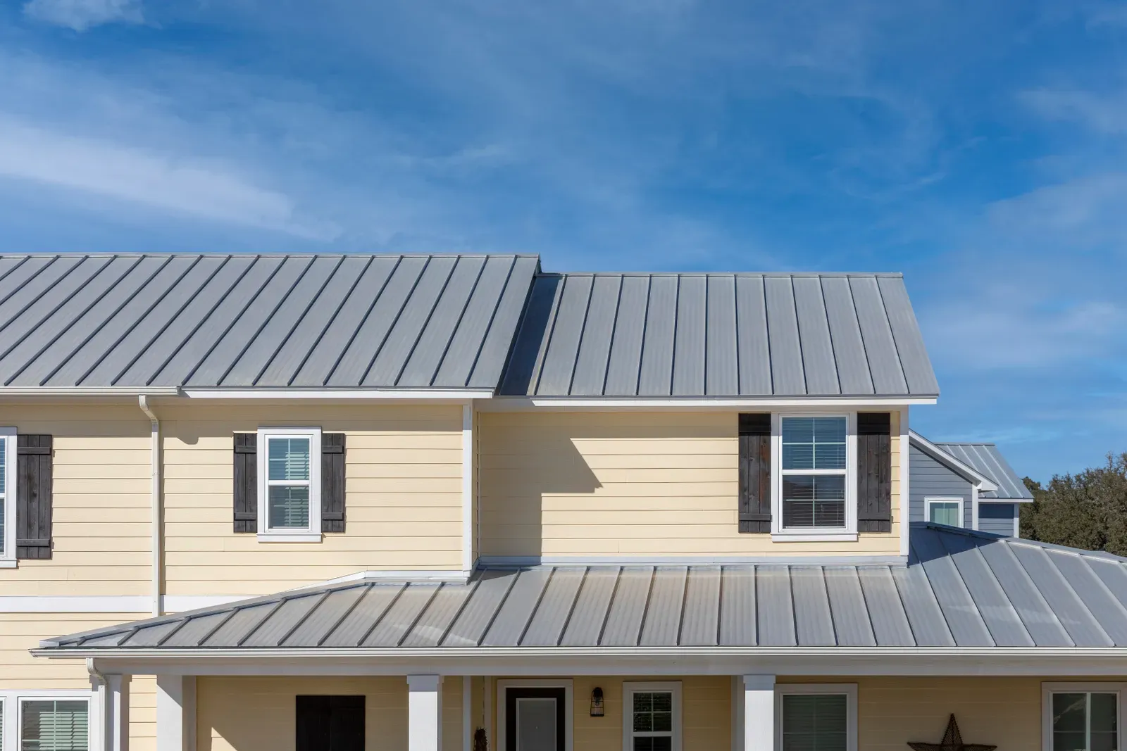 A newly installed metal residential roof, hero-approved | You First Home Services