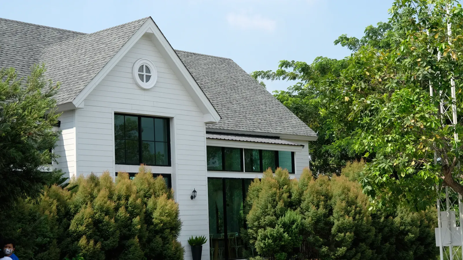 A residential roof being replaced due to impact damage, approved by a hero. | You First Home Services