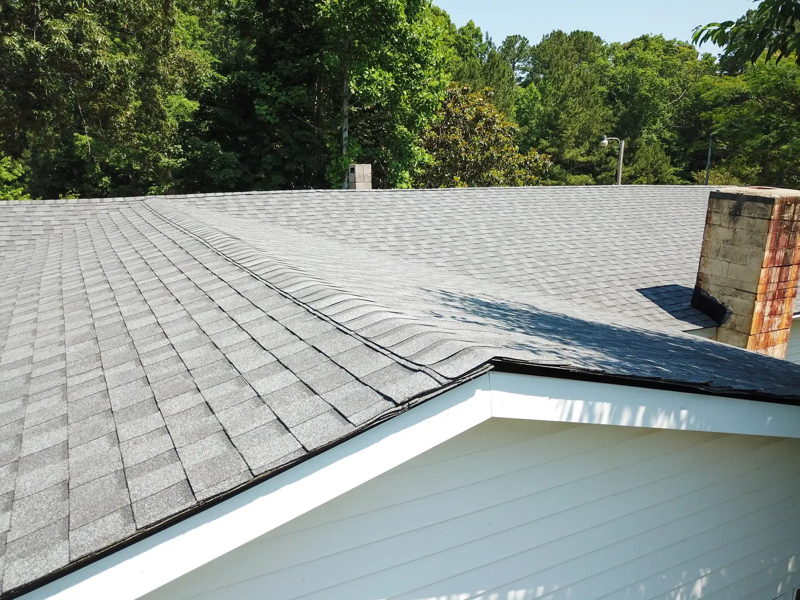 A new and impact-resistant residential roof replacement, hero-approved. | You First Home Services