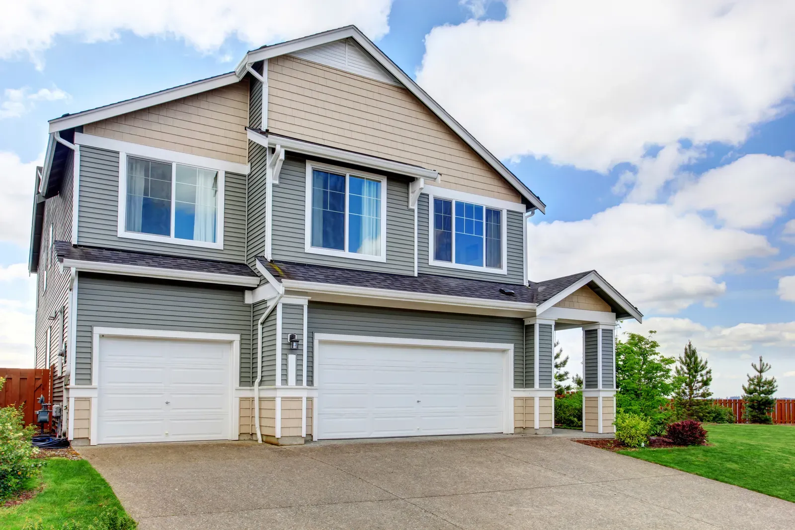 A close-up photo of unprocessed vinyl siding material. | You First Home Services